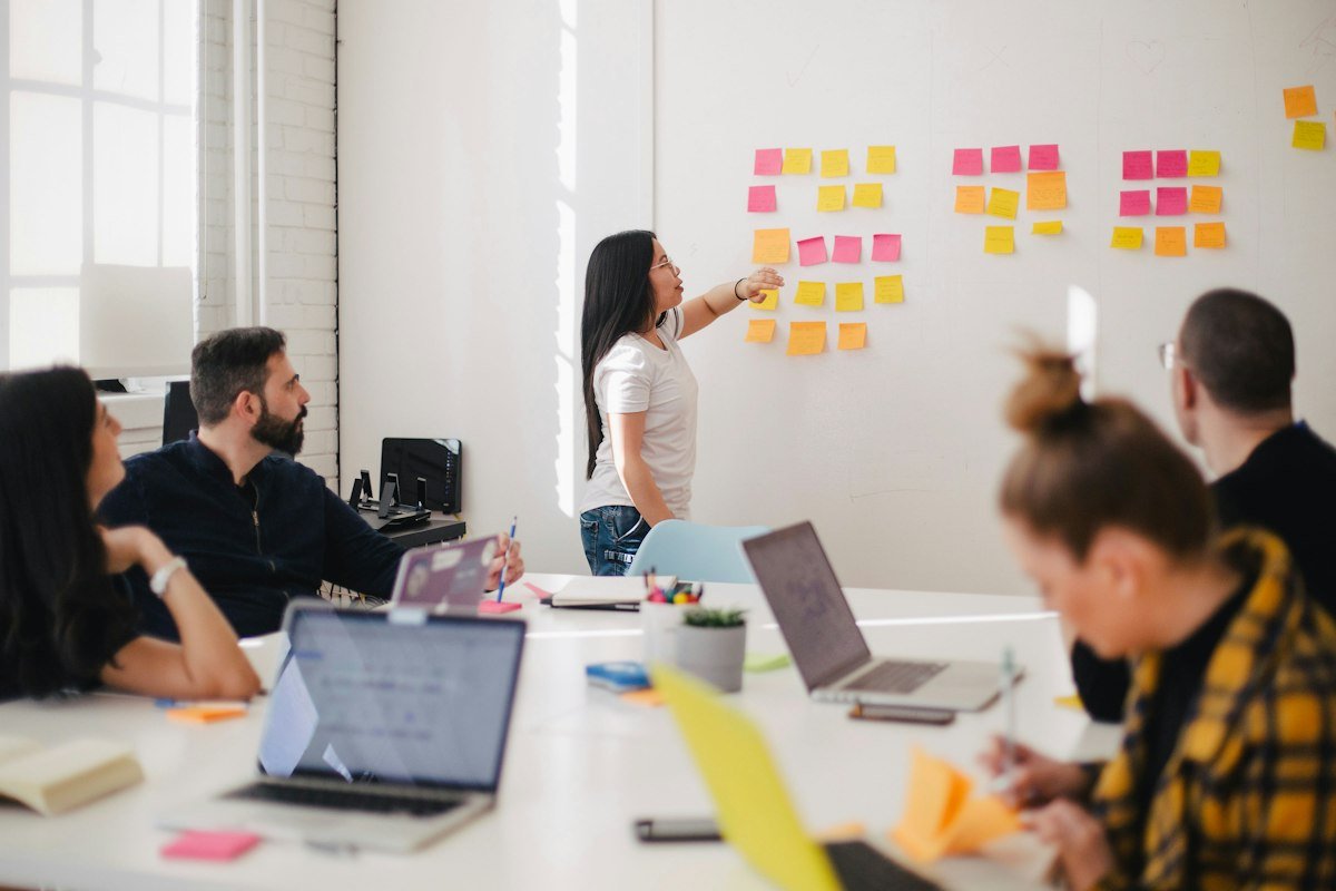 Team workshop with sticky notes during IT training